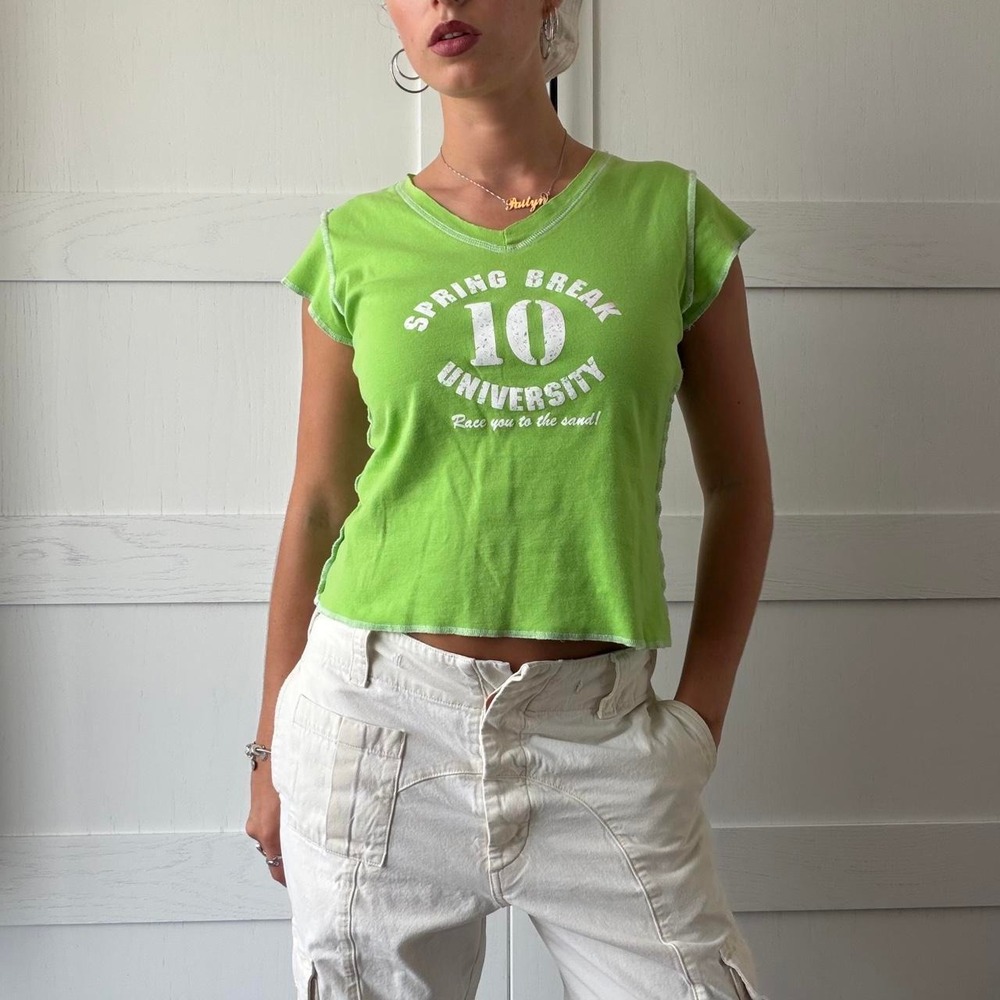 Y2K No Boundaries lime green fitted baby tee featuring a distressed white